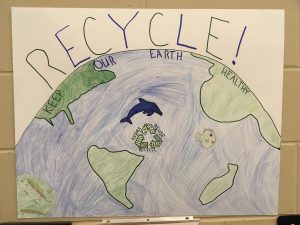 A student created poster about recycling.
